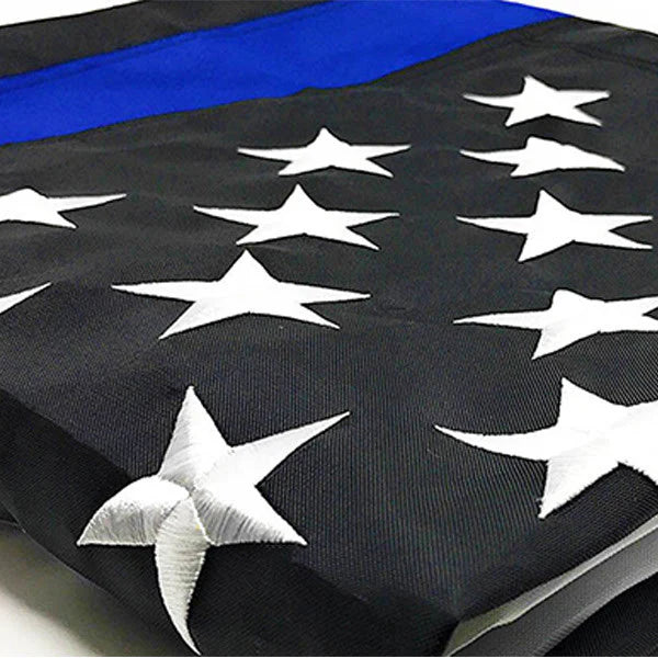Load image into Gallery viewer, Close-up detail of the Thin Blue Line American Flag showcasing the quality of the white embroidered stars and the blue line.