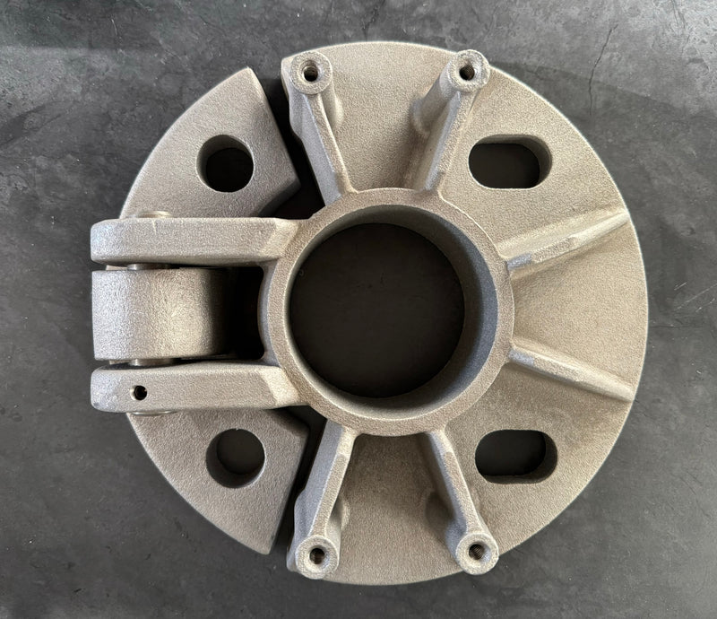 Load image into Gallery viewer, Top-down view of the heavy-duty round anchor plate component of the Tilting Shoe Base with multiple bolt holes.