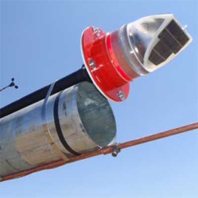 The Avlite AV-OL-70R solar obstruction light shown installed on top of a galvanized metal pole, demonstrating its use in an outdoor application.