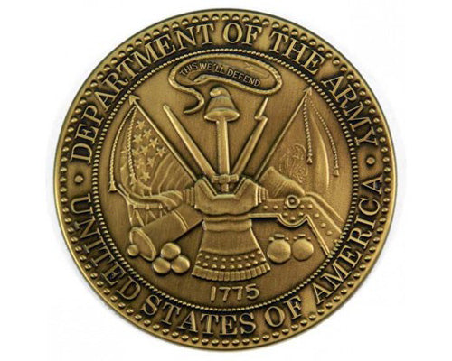 Brass medallion featuring the seal of the United States Department of the Army, with crossed cannons, a sword, and a motto ribbon reading "THIS WE'LL DEFEND."