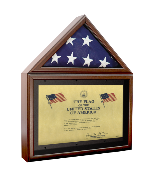 Made in the USA capitol flag display case in a cherry laminate finish, featuring a triangular shadowbox for a folded American flag above a lower compartment for displaying a flag certificate or document.