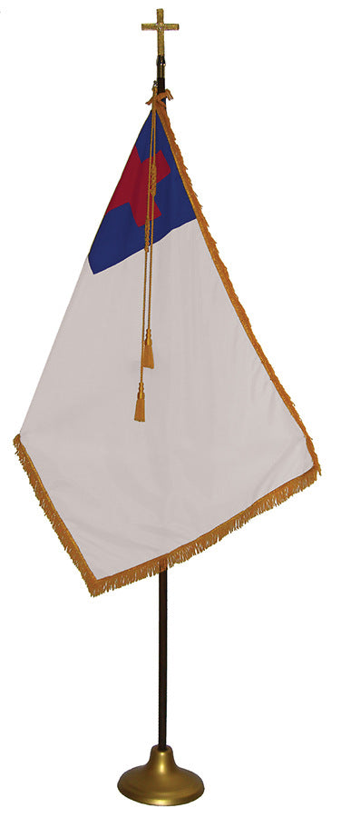 Complete Christian Nylon Indoor Flag Set mounted on a pole with a gold base, featuring gold fringe, tassels and cord, and a decorative gold cross finial.