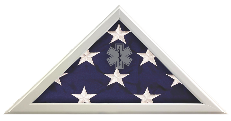 Load image into Gallery viewer, Triangular flag case display showing a folded American flag with a gray Star of Life EMS logo etched onto the protective glass.
