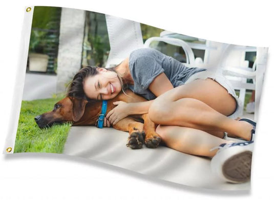 Custom value printed single-sided polyester flag displaying a full-color, high-resolution photo of a smiling woman hugging her brown dog on the ground.