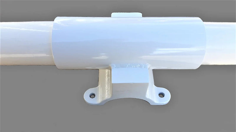 Load image into Gallery viewer, Close-up of fiberglass flagpole yardarm center bracket showing smooth white finish and mounting holes.
