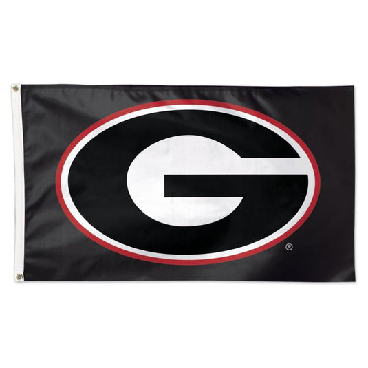 Deluxe 3' x 5' NCAA Georgia Bulldogs flag featuring the team's official logo on a black field. The logo is a stylized white "G" outlined in black and a prominent red ellipse. The collegiate flag includes a white canvas header and brass grommets for flying.