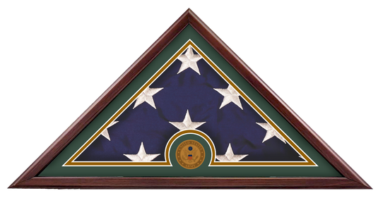 Liberty Freedom Flag Case with a folded US flag and a US Army medallion, set against a dark green mat in a wood frame.