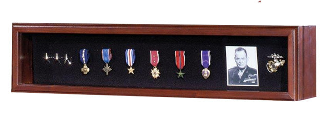Load image into Gallery viewer, Horizontal, dark wood medal display case featuring several military medals, service pins, a Marine Corps emblem, and a small black and white portrait of a serviceman on a black velvet background.
