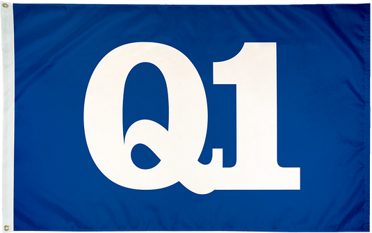 Blue nylon ISO Q1 flag featuring large white “Q1” lettering centered on the field, symbolizing first quarter quality standards, with reinforced header and brass grommets on the hoist side.