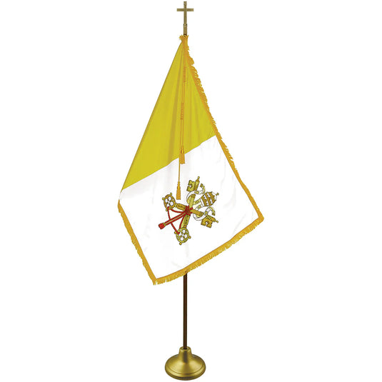 Deluxe Papal nylon indoor flag set mounted on a gold-colored flagpole and stand. The square Vatican City flag features the yellow and white vertical division and the Keys of Saint Peter coat of arms, trimmed with gold fringe and topped with a brass cross ornament.