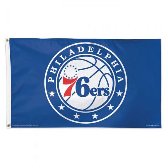 Philadelphia 76ers flag deluxe 3 x 5 NBA in royal blue featuring white circular team logo with basketball, red and blue 76ers wordmark, and stars with grommets