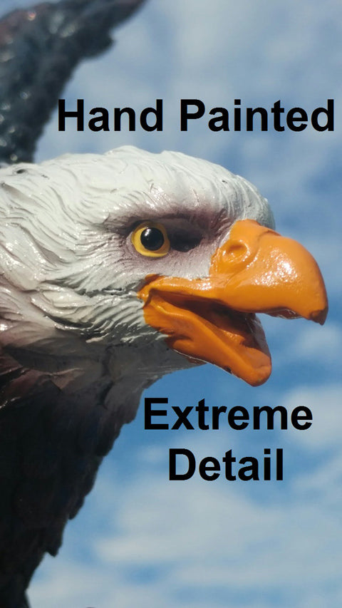 Extreme close-up detail of the hand-painted head, beak, and eye of the Resin Landing Eagle Flagpole Ornament.