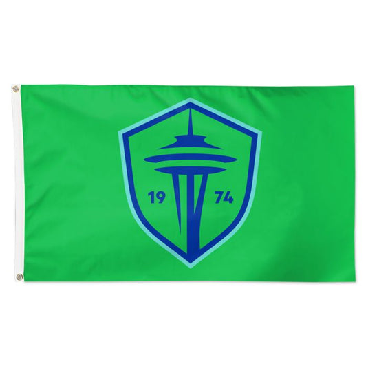 A green flag with a blue emblem featuring the Seattle Space Needle and the text '1974'.