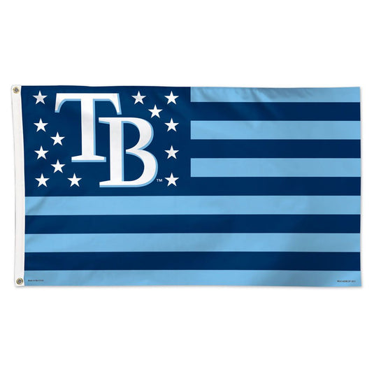 Blue flag with white "TB" initials and 12 stars on the left. Right side has nine horizontal stripes in varying blue shades. Represents the Tampa Bay Rays.