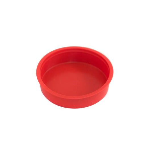Bright red plastic Titan Telescoping Flagpole Ground Sleeve Cap used to cover the opening when the pole is removed.