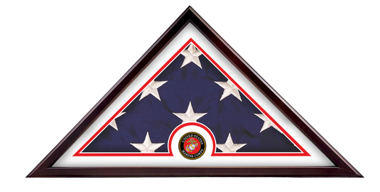 Veteran Freedom Flag Case with a dark wood frame and red border mat, showcasing a folded flag with the official US Marine Corps medallion prominently displayed at the base.