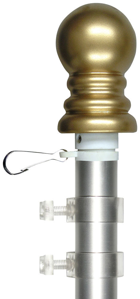 Close-up of a silver aluminum rotating flagpole with a gold decorative ball topper and anti-furl rings attached.