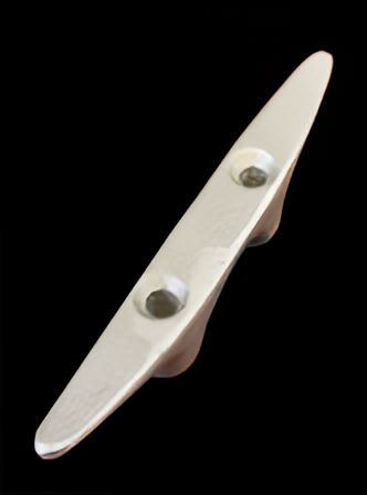 Load image into Gallery viewer, Angled, close-up view of a shiny, silver Cast Aluminum Flagpole Cleat on a black background, highlighting the smooth, pointed edge and the deep counter-sunk areas around the two screw holes.
