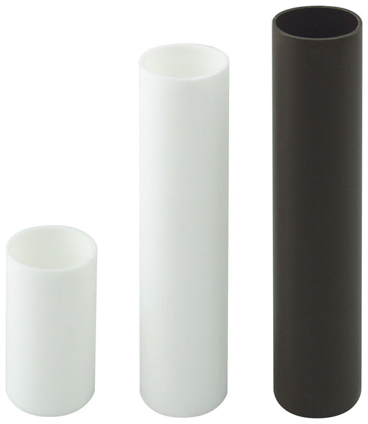 Three cylindrical plastic Floor Stand Sleeve Adapters in various sizes and colors. The group includes a small white adapter, a tall white adapter, and a tall dark brown or black adapter, used to adjust flagpole diameter for indoor floor stands.
