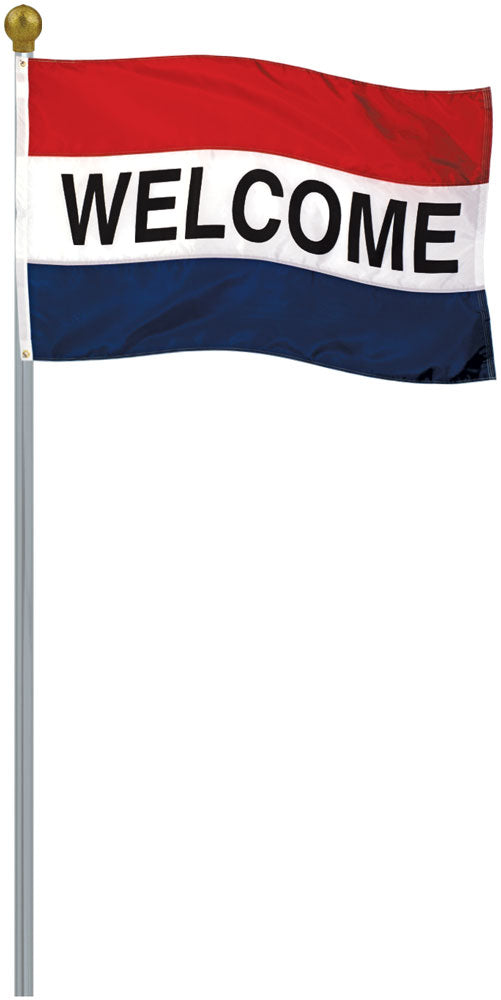 The Lawn-Mate Aluminum Ground Set Flagpole shown with a gold ball top and flying a red, white, and blue WELCOME flag.