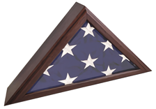 American-made Liberty Flag Case in dark wood, holding a folded American flag with the blue field and stars visible.