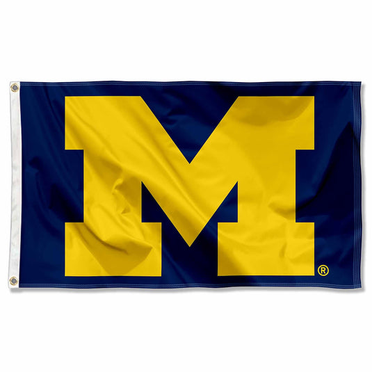 Deluxe 3x5 NCAA Michigan Wolverines Flag showing the gold "M" logo on a navy blue field.