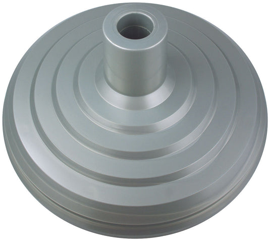 Silver metal weight plate with a central hub, featuring concentric grooves and a raised hole in the center for mounting an indoor flagpole.